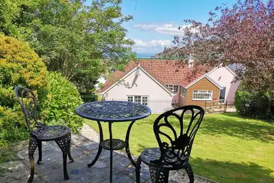 Image de Famille et chien amical chalet 4 chambres avec vue sur mer, village Porlock, Exmoor