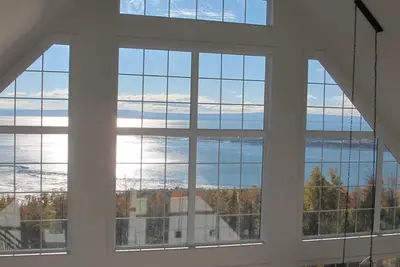Image de Prestigieux chalet 5 chambres offrant une vue imprenable sur le St-Laurent
