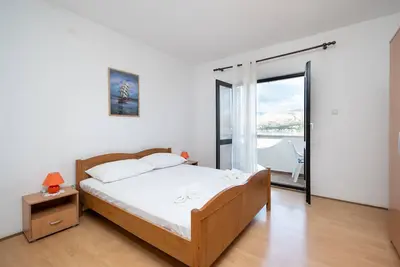 Image de Appartement de deux chambres avec la terrasse et la vue sur le mer Pag (A-15765-b)
