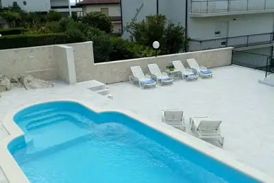 Appartement confort avec terrasse, vue mer et piscine proche plage