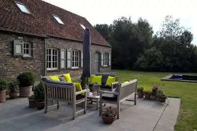 Image de L'appartement de vacances avec vue sur le terrain près de Bruges