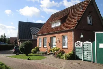 Image de Maison de vacances confortable près de l'île Elbe de Krautsand pouvant accueillir jusqu'à cinq personnes.
