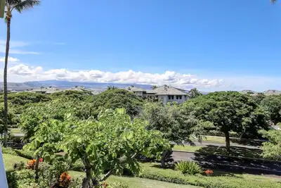 Condo au deuxième étage avec piscine partagée et véranda enveloppante avec une vue imprenable