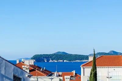 Image de Chambre dans un appartement duplex confortable, élégant et moderne avec une vue magnifique.