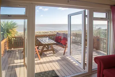 Image de Sole Bay Lodge - Lodge de vacances romantique avec une vue magnifique sur la mer