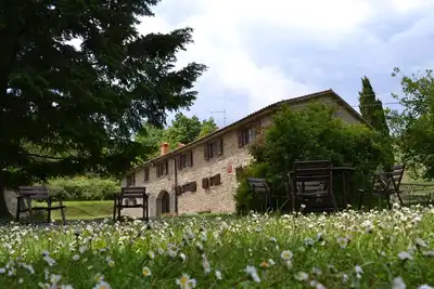 Image de 2 chambres confortables dans une magnifique Toscane avec un style rustique