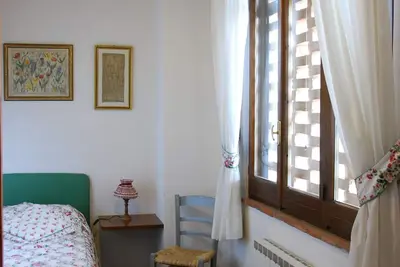 Image de Agréable appartement dans une maison de vacances avec Wifi, piscine, patio, près de San Gimignano