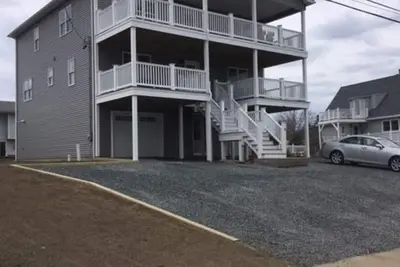 Image de Maison neuve avec vue sur l'océan - promenade jusqu'à la plage Roger Wheeler.
