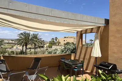 Image de Un bel appartement de 3 chambres avec une vue imprenable surplombant un parcours de golf