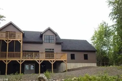 Image de Belle nouvelle maison au bord du lac sur le lac Ebeemee