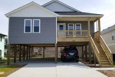 Image de Maison neuve. Marcher Ă la plage!
