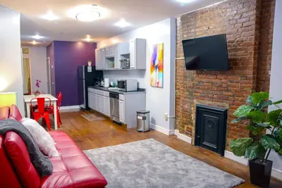 Image de Manhattan Chic Appartement 1 Chambre Avec Jardin Privé