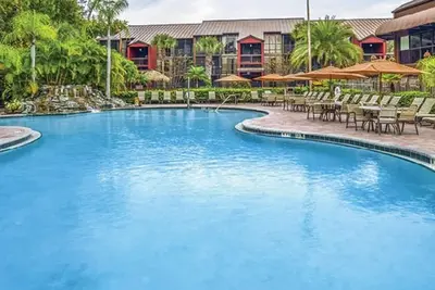 Image de 2 Bdrm Condo ~ Parkway International Resort ~ Sleeps 6 ~ Piscine CHAUFFÉE ~ Disney 1 Mile