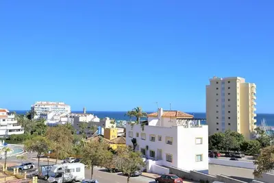 Image de Bel appartement près du port avec air conditionné, Cinq minutes de la marina, des bars et de la plag