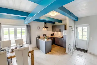 Image de Appartement 5 étoiles sous chaume dans un endroit calme avec une vue unique