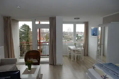 Image de Confortable appartement vue sur la mer piscine + sauna dans la maison Ferienpark Strandnah