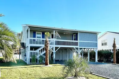 Image de Great Dune Home dans un quartier calme.