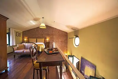 Image de Appartement loft ouvert à 20 minutes à pied de Sienne