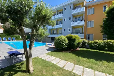 Image de Appartement de vacances avec piscine commune et balcon