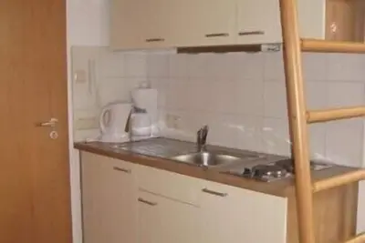 Image de Appartement \"Holzknecht\" 24 qm Dusche/Wc, bis 4 Personen, KĂĽchenteil, Wohn/Schlafraum kombiniert, Nichtraucher, 3 Sterne