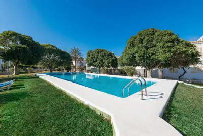 Image de Ropit - Apartment with shared pool in Port d'alcĂşdia. Free WiFi