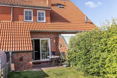 Image de Cette maison bourgeoise impressionne par son mobilier amical.