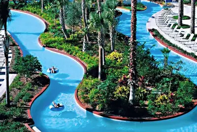 Image de Ouverture Grande \/ Chauffage Gratuit Dans Le Spa \/ Minutes de Disney \/ WaterPark \/ Arcade \/ Bar \/ Gym \/ Ac \/ WiFi