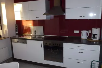 Image de 3-Zi. -FeWo 300m de la plage, propre chaise de plage, WiFi, analyse dans la maison