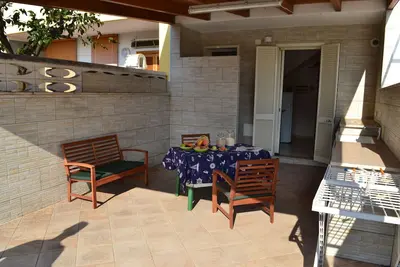 Image de Appartement confortable près de la plage avec patio et balcon