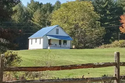 Image de Four Acre Farmhouse avec une vue spectaculaire sur la montagne