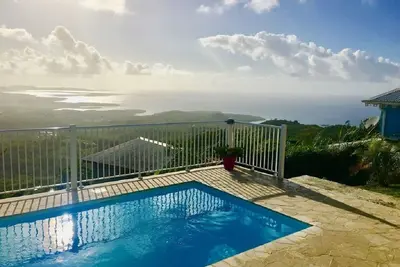 Image de Villa de standing avec piscine, vue exceptionnelle et un superbe jardin tropical
