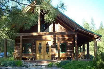 Image de Belle cabine de Sloway par la rivière Clark Fork