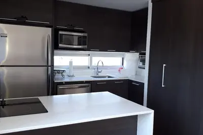 Image de Appartement confortable et central avec terrasse privée et vue