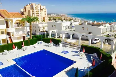 Image de Appartement avec piscine, balcon et vue sur la mer - à seulement 400m à pied de la plage de La Mata!