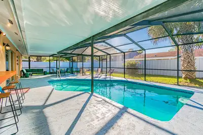 Image de Charmante maison avec superbe piscine chauffée! Près de l'aéroport, des plages et des attractions