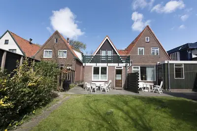 Image de Belle maison de vacances avec jardin avec 3 chambres pour 6 personnes près de la plage.