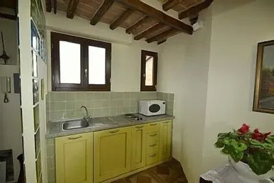 Image de Appartamento Onorio: Un élégant appartement situé dans le centre médiéval de Sienne.