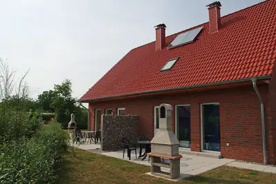 Image de Maison de vacances de 5 chambres avec jardin