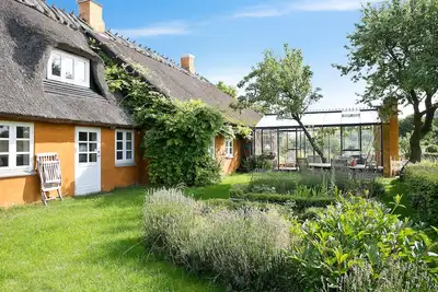 Image de Tranehuset - gîte avec accès direct à la plage - lun