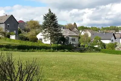 Image de Maison avec vue, terrasse et jardin d'hiver