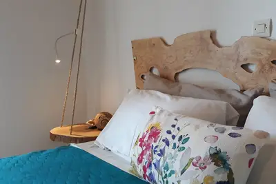 Maison confortable avec une décoration rustique moderne à seulement 20 mètres de la plage de sable
