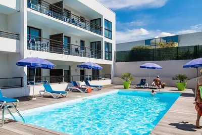 Image de Super endroit! Appart charmant avec Wi-Fi Gratuit et accès piscine