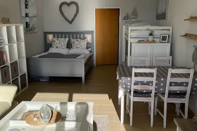 Image de Mon royaume (Süssau) avec loggia et vue sur la mer