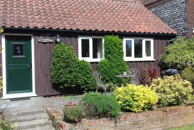Image de Thorpegate Cottage - Situé autour d'une ancienne ferme dans un village
