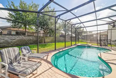 Image de Awesome 6br / 4ba Resort Private Pool / Spa - 2 mi to Disney - Salle de jeux / Salles à thème