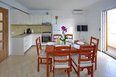 Image de Appartement de trois chambres avec le balcon Sukosan, Zadar (A-16641-b)