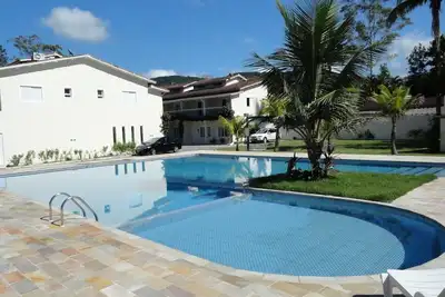 Image de Maison de plage en préservatif. gated, 2 suites, air conditionné, churr. , 2 piscines.