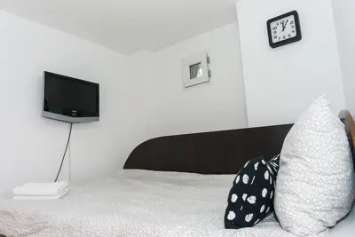 Image de Chambre privée et kitchenette au centre-ville