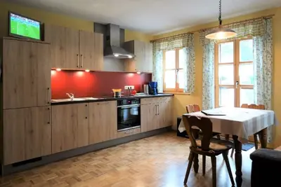 Image de Appartement confortable avec terrasse meublée et accès au jardin