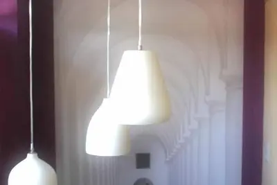 Image de Appartement pour familles avec lits à baldaquin